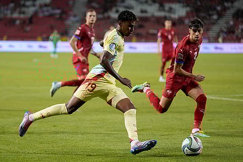 2024-25 Nations League Football Serbia vs Spain: Spain's Lamine Yamal challenges for the ball with Serbia's Veljko Birmancevic